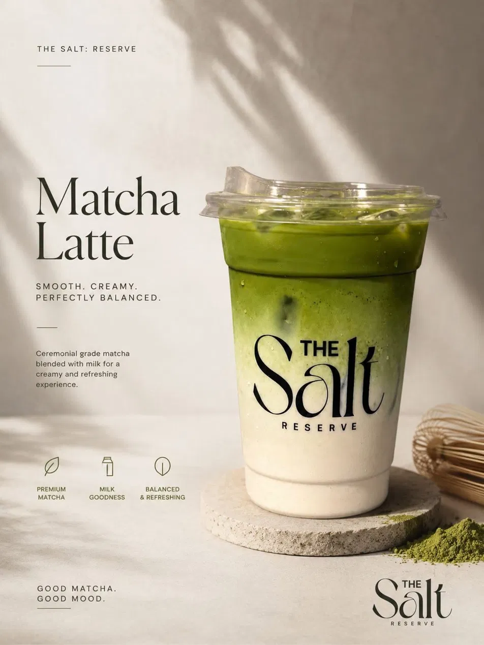 Iced matcha latte with ceremonial grade matcha, whisk, and powder